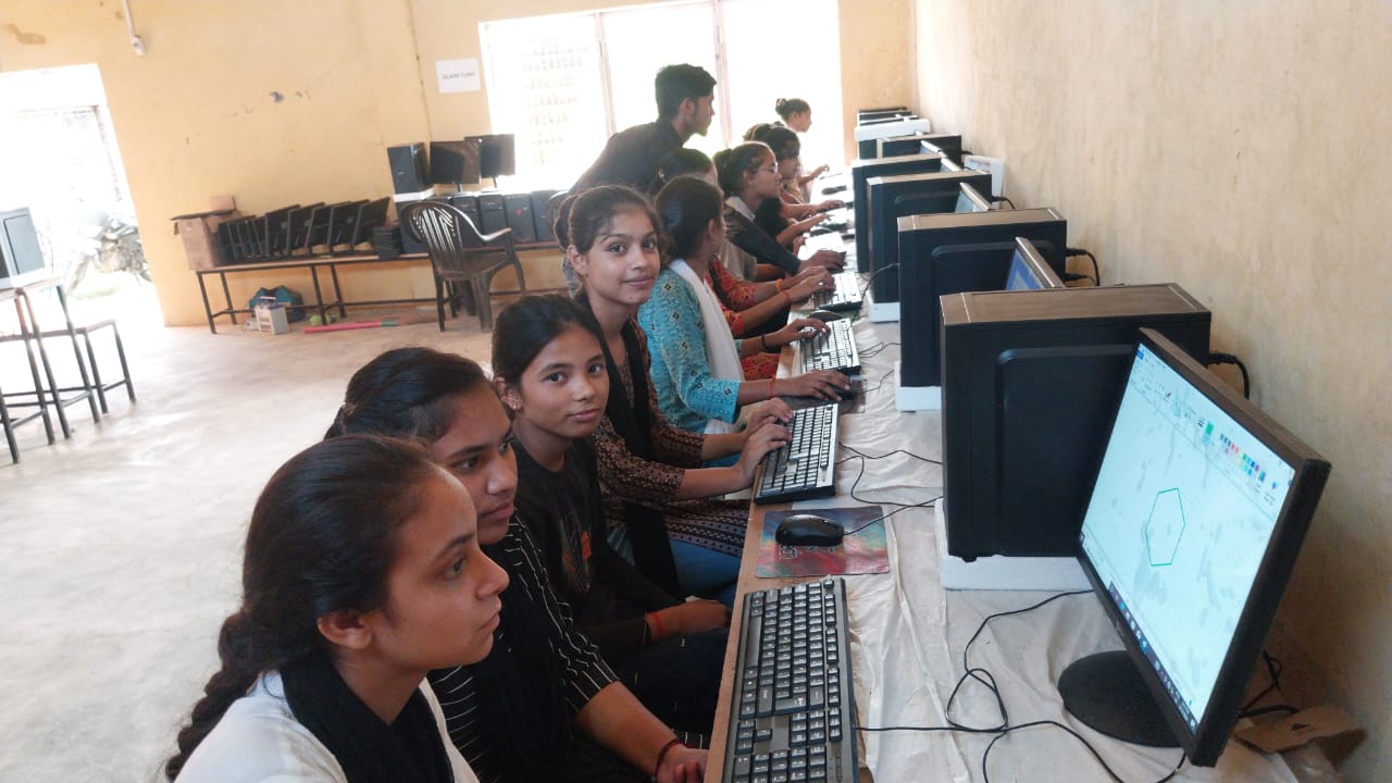 SICSM students practicing computer skills in modern lab